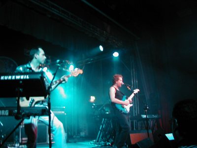 Pendragon bass player and guitarist on stage